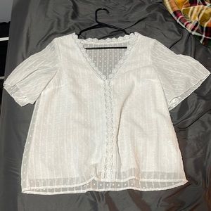 white patterned blouse